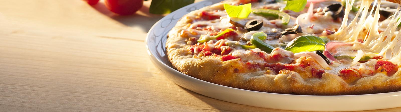 Delicious pizza<br />with Emborg<br />Shredded Mozzarella